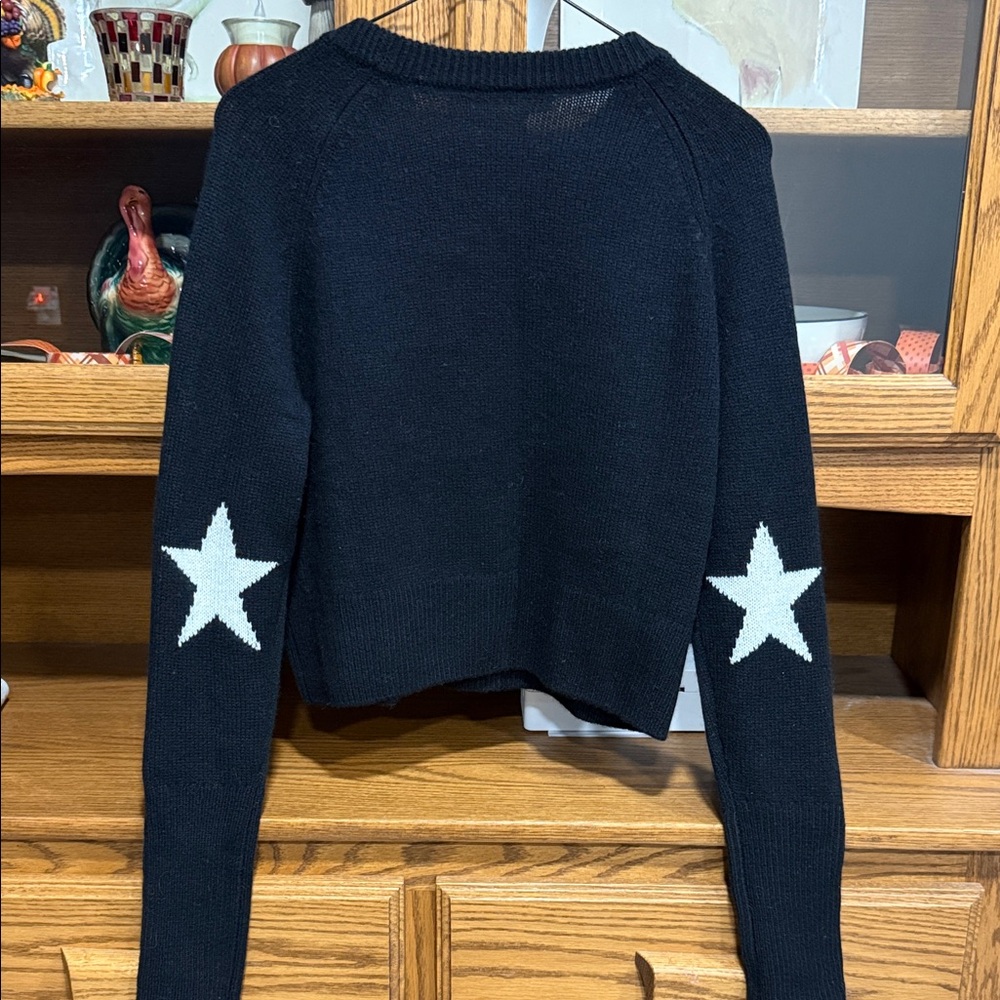 100% Cashmere One Grey Day Elegant Black Sweater with Star Accents on the elbows